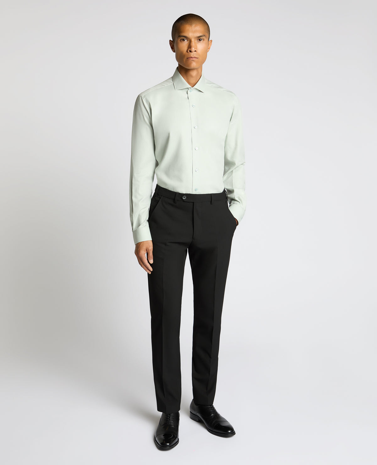 Man wearing a green Tapered Fit Cotton Shirt
