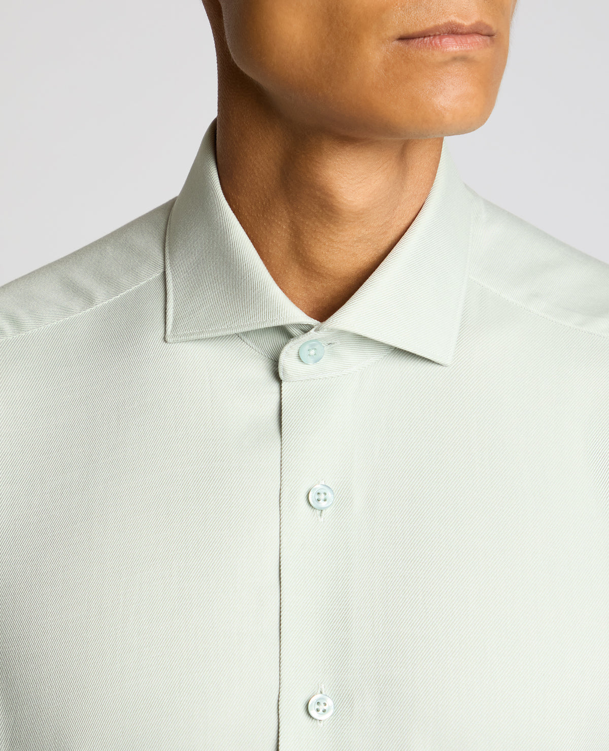 Man wearing a green Tapered Fit Cotton Shirt