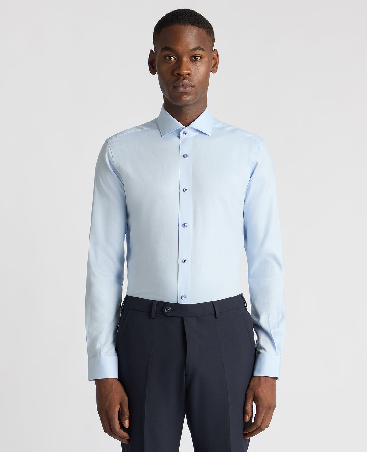 Man wearing a blue Slim Fit Cotton Twill Shirt