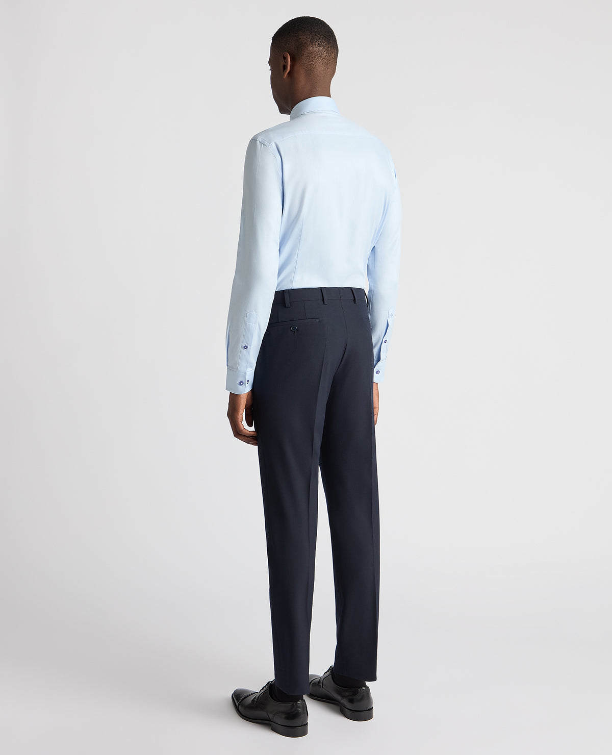 Man wearing a blue Slim Fit Cotton Twill Shirt