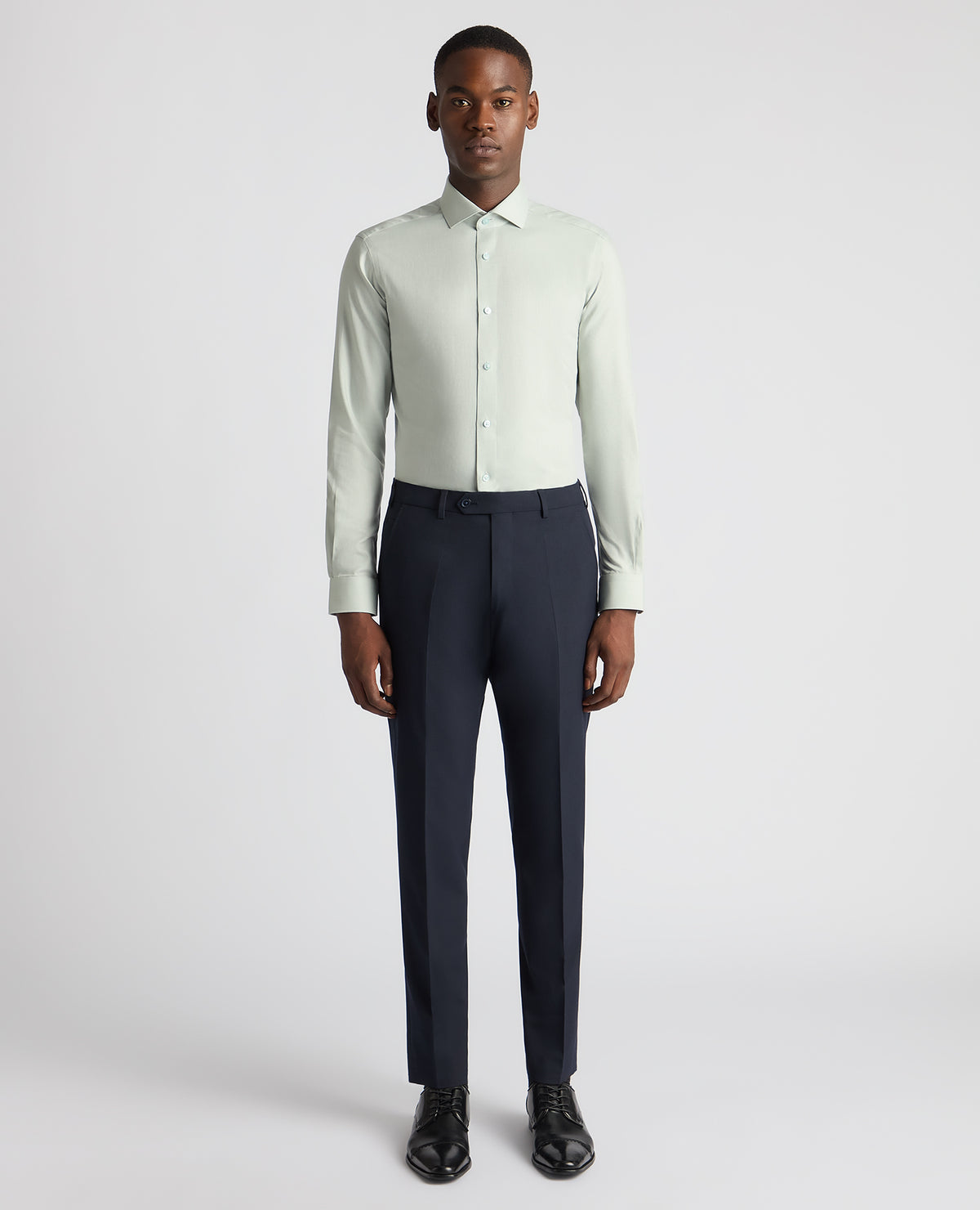 Man wearing a green Slim Fit Cotton Twill Shirt