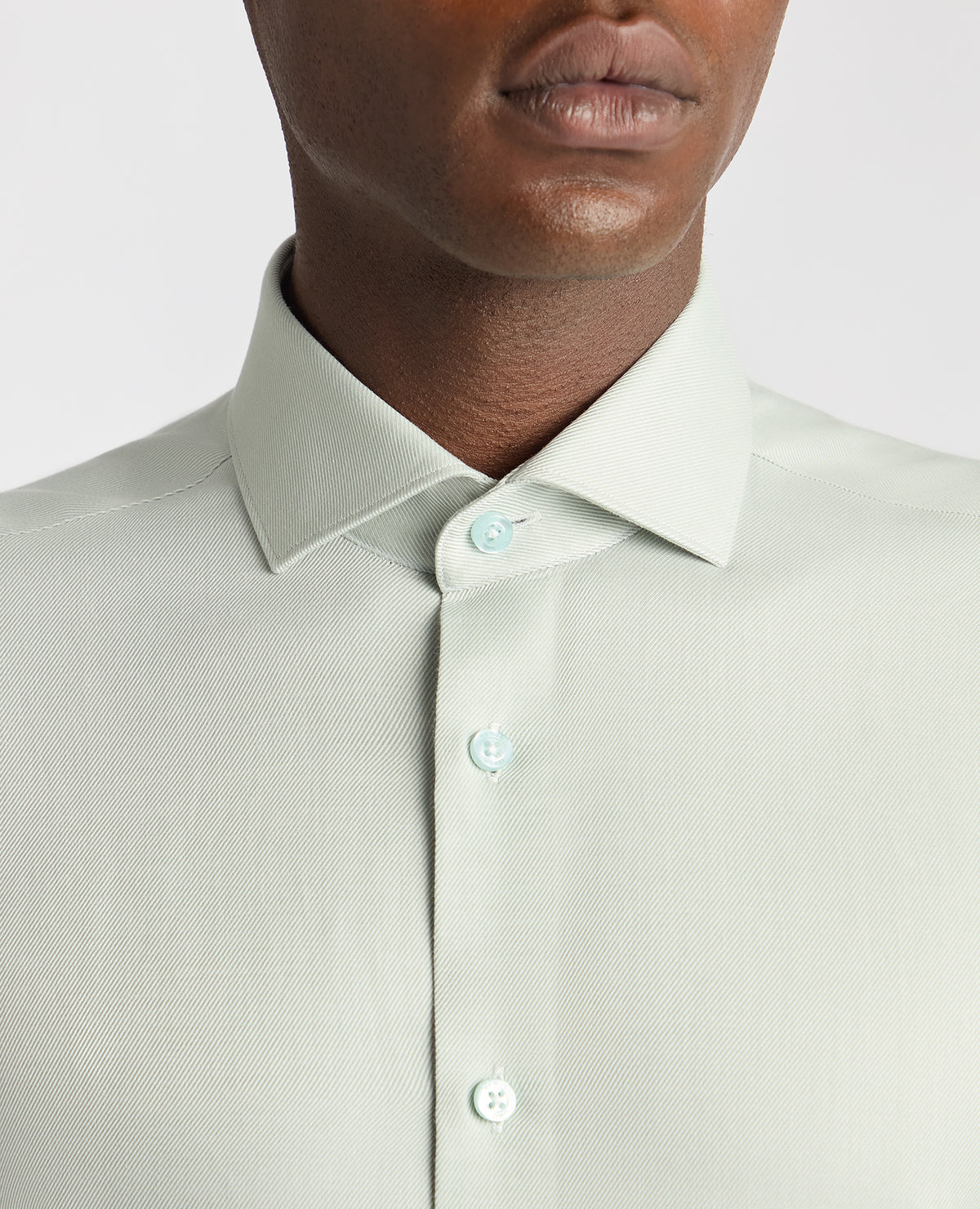 Man wearing a green Slim Fit Cotton Twill Shirt