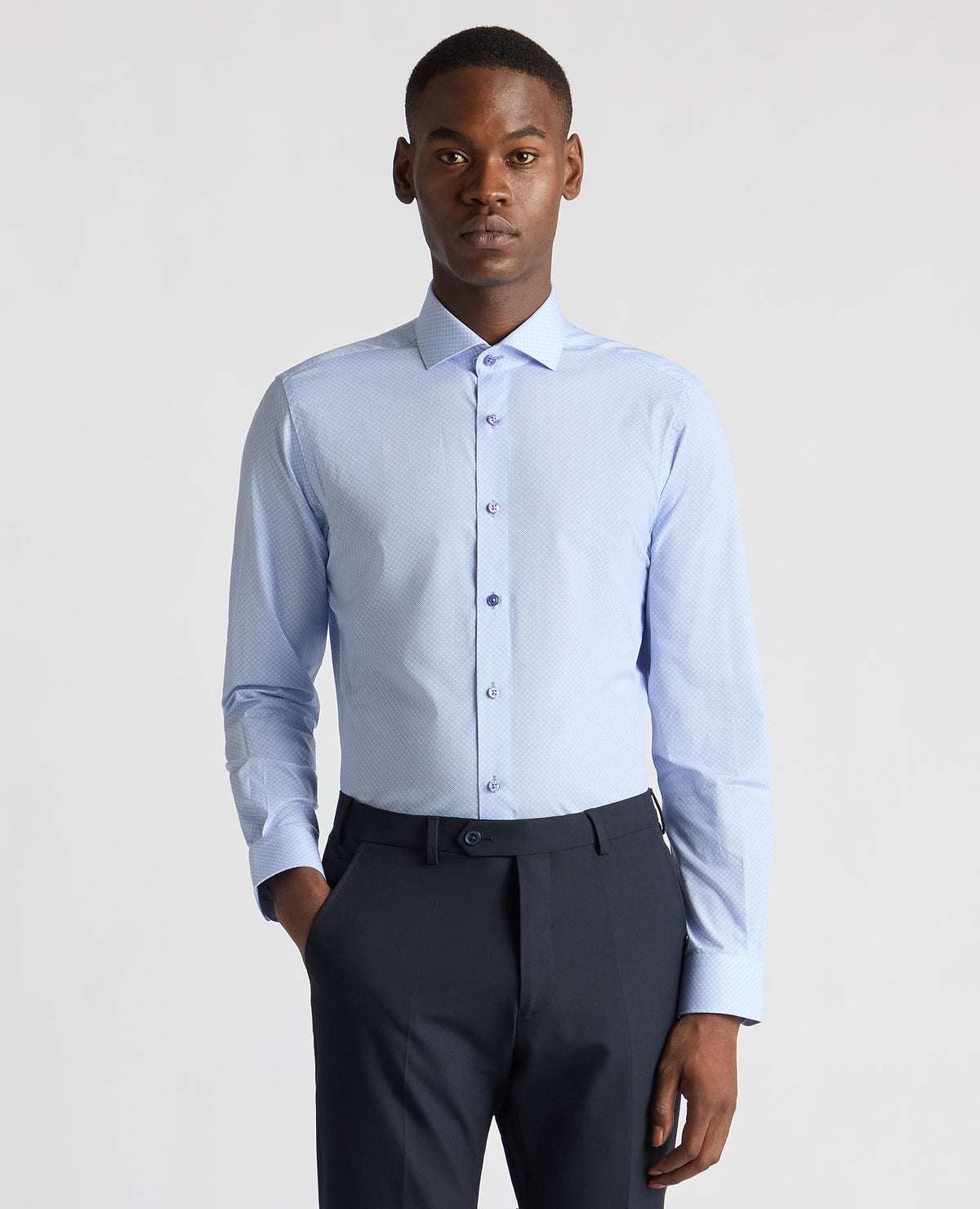Man wearing a blue Tapered Fit Cotton Printed Shirt