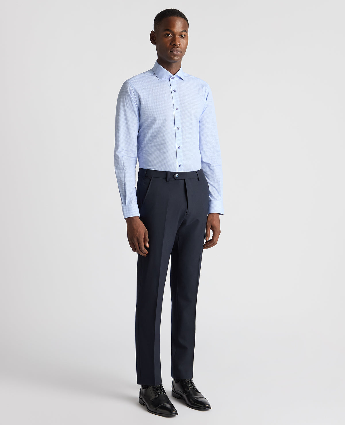 Man wearing a blue Tapered Fit Cotton Printed Shirt