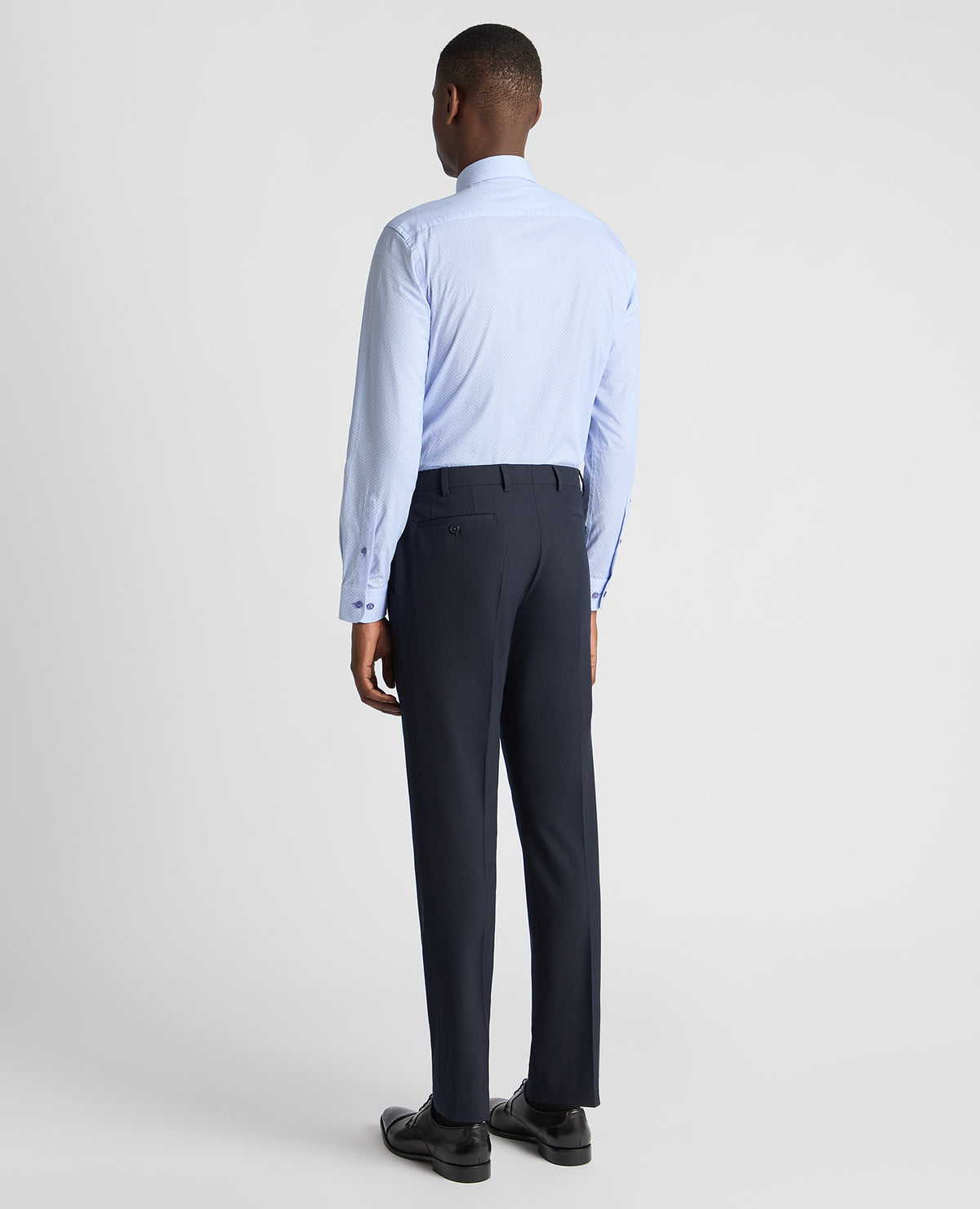 Man wearing a blue Tapered Fit Cotton Printed Shirt