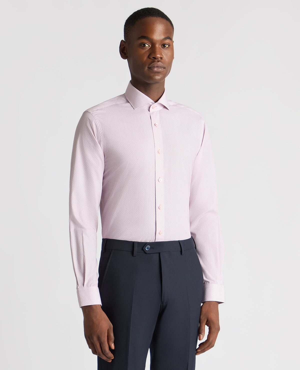 Man wearing a pink Tapered Fit Cotton Printed Shirt