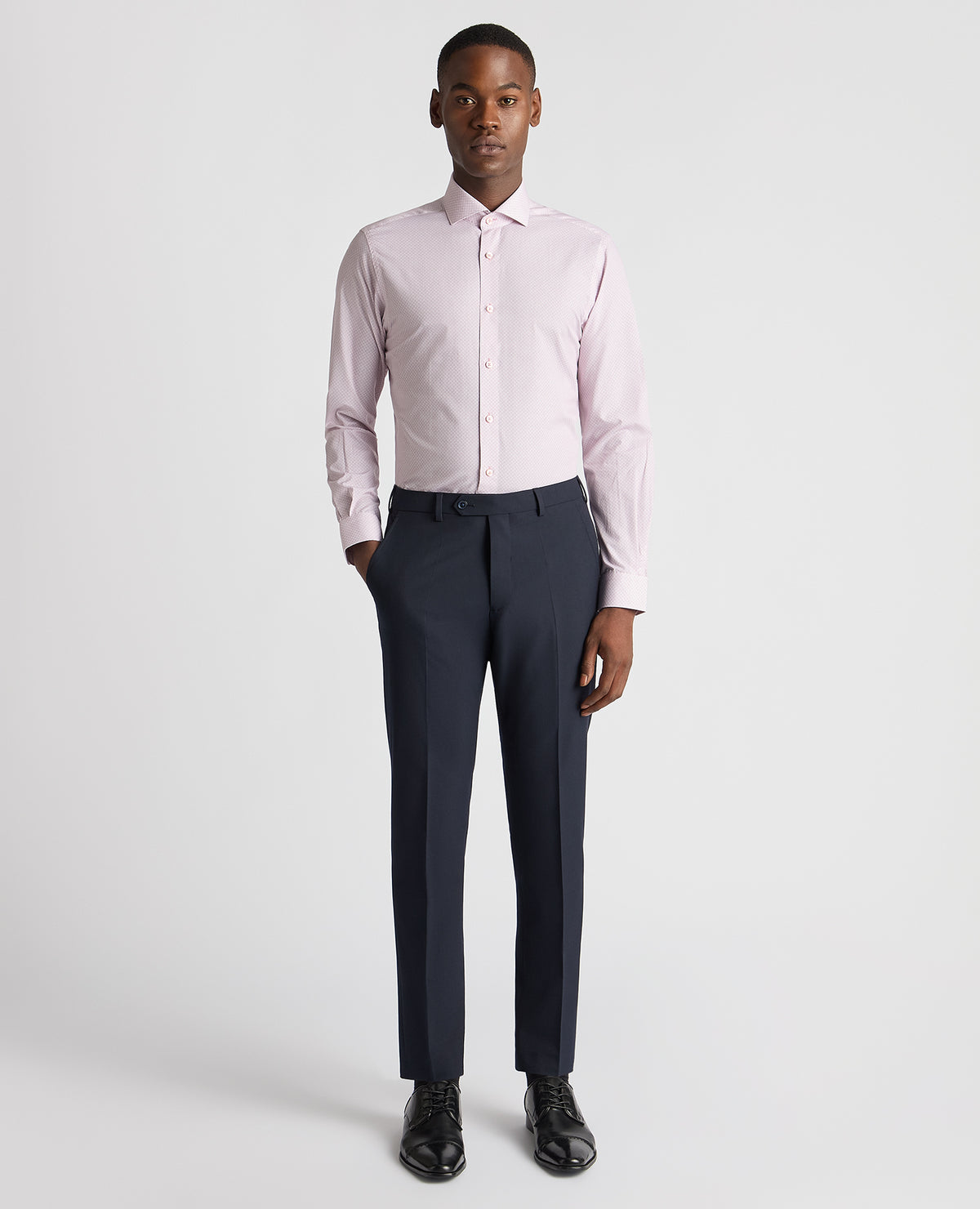 Man wearing a pink Tapered Fit Cotton Printed Shirt
