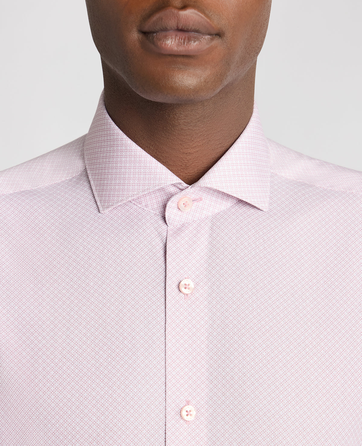 Man wearing a pink Tapered Fit Cotton Printed Shirt