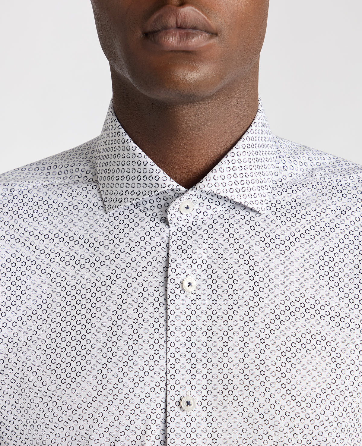 Man wearing a navy Tapered Fit Cotton Stretch Printed Shirt