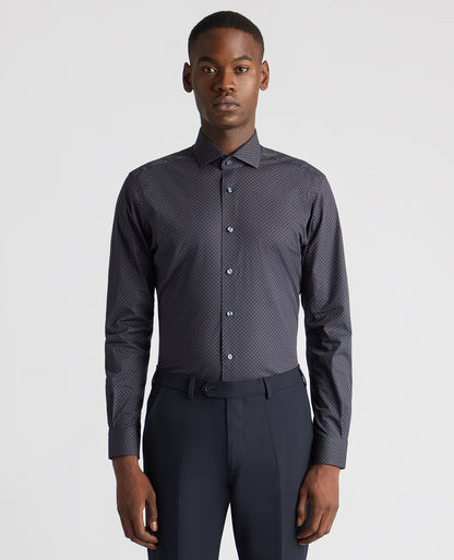 Man wearing a navy Tapered Fit Cotton Stretch Printed Shirt