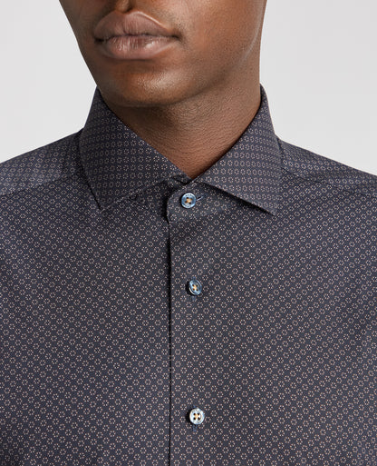 Man wearing a navy Tapered Fit Cotton Stretch Printed Shirt