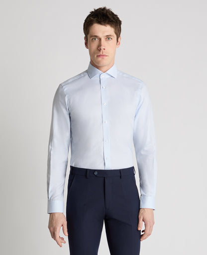 Man wearing a blue formal shirt