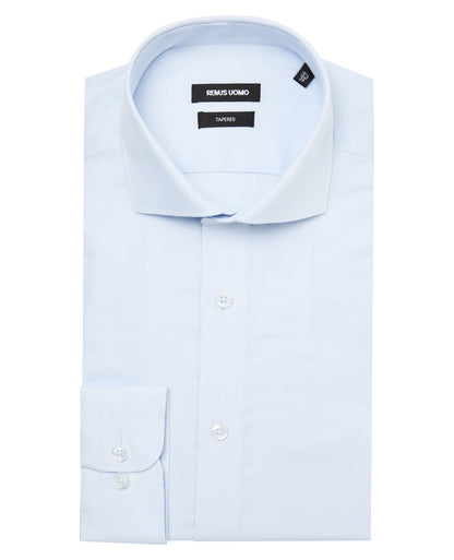 Man wearing a blue formal shirt