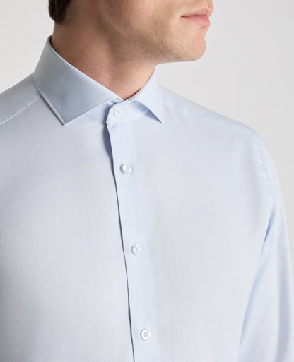 Man wearing a blue formal shirt