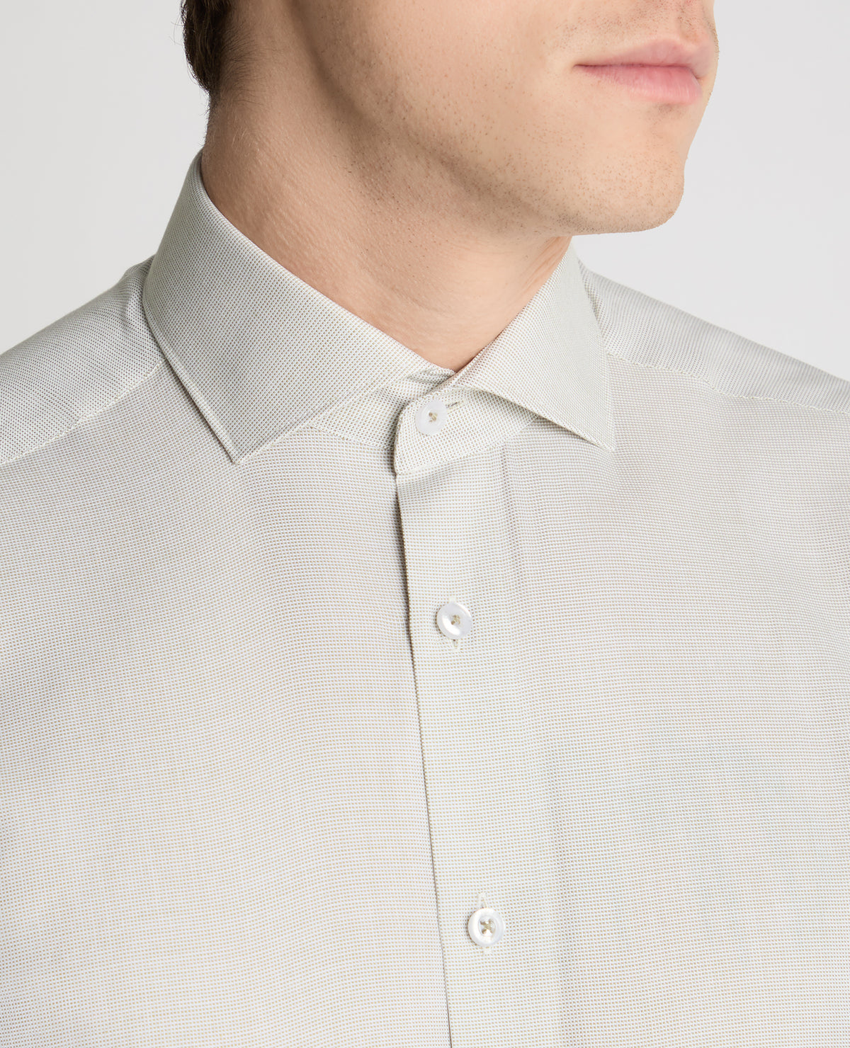 Man wearing a green formal shirt