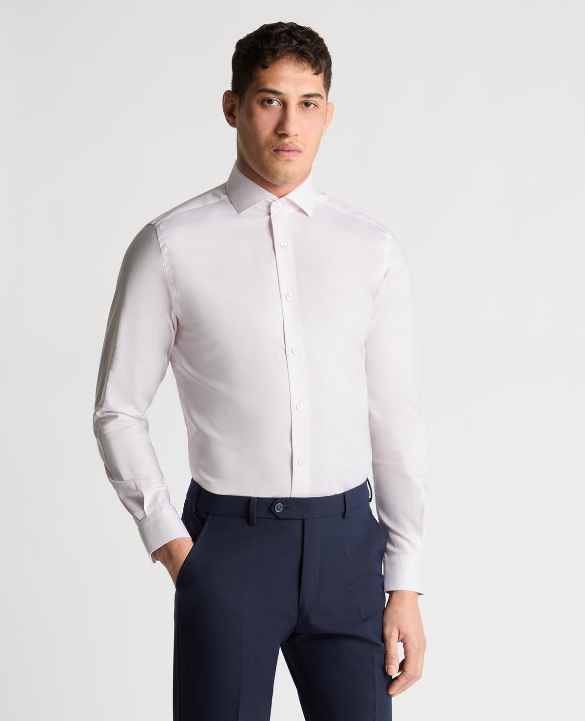 Man wearing a pink formal shirt