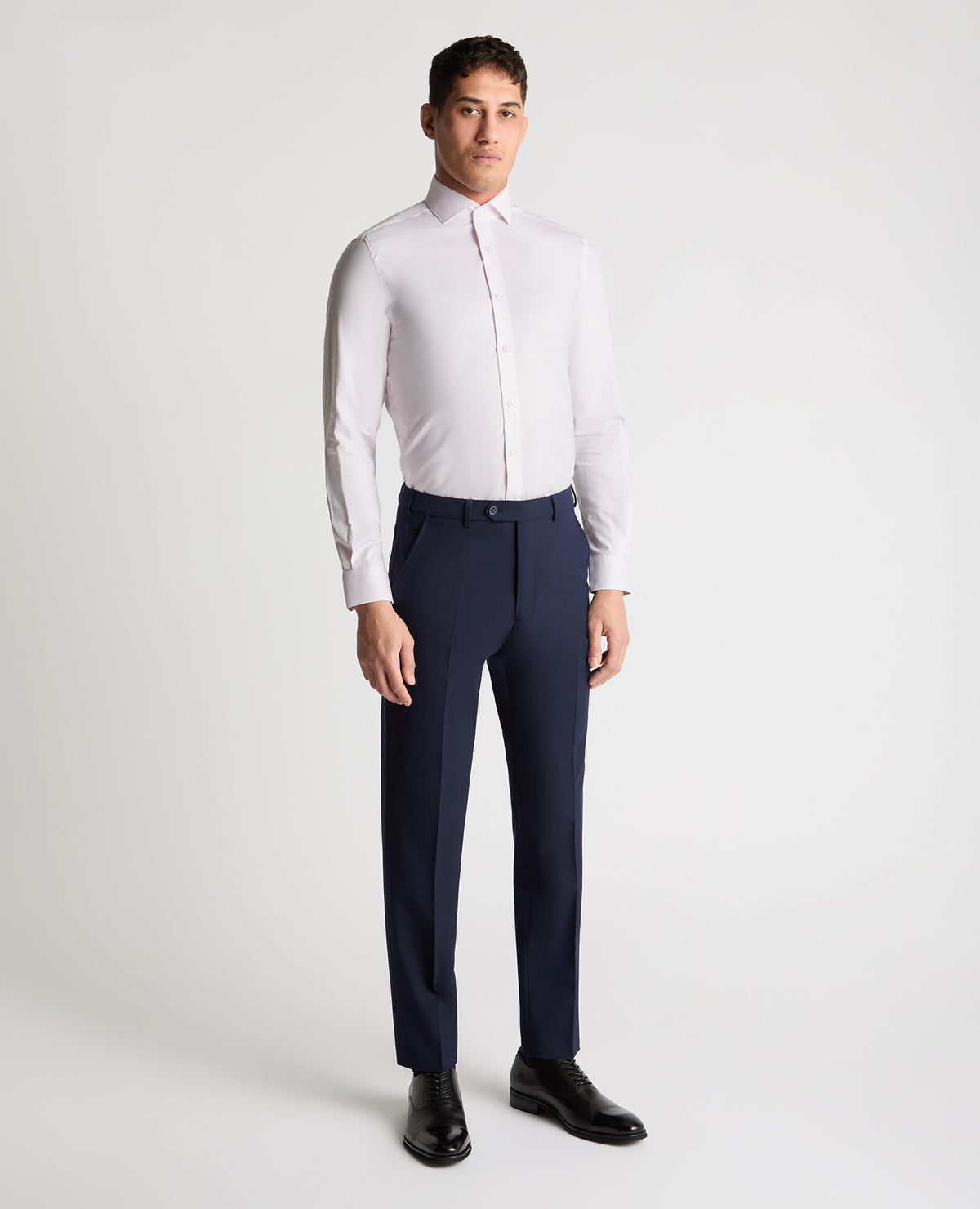 Man wearing a pink formal shirt
