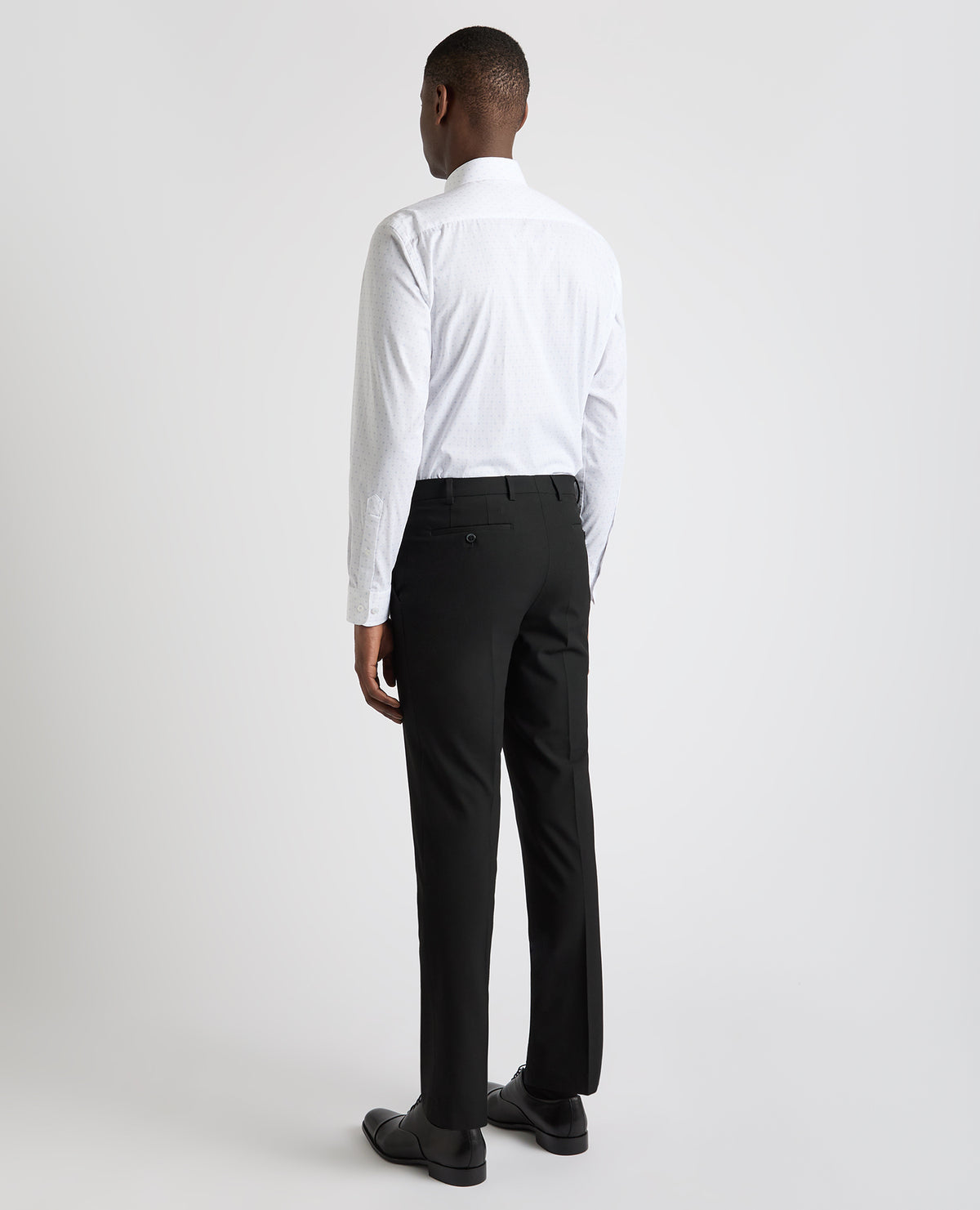 Man wearing a blue Tapered Fit Cotton Stretch Shirt
