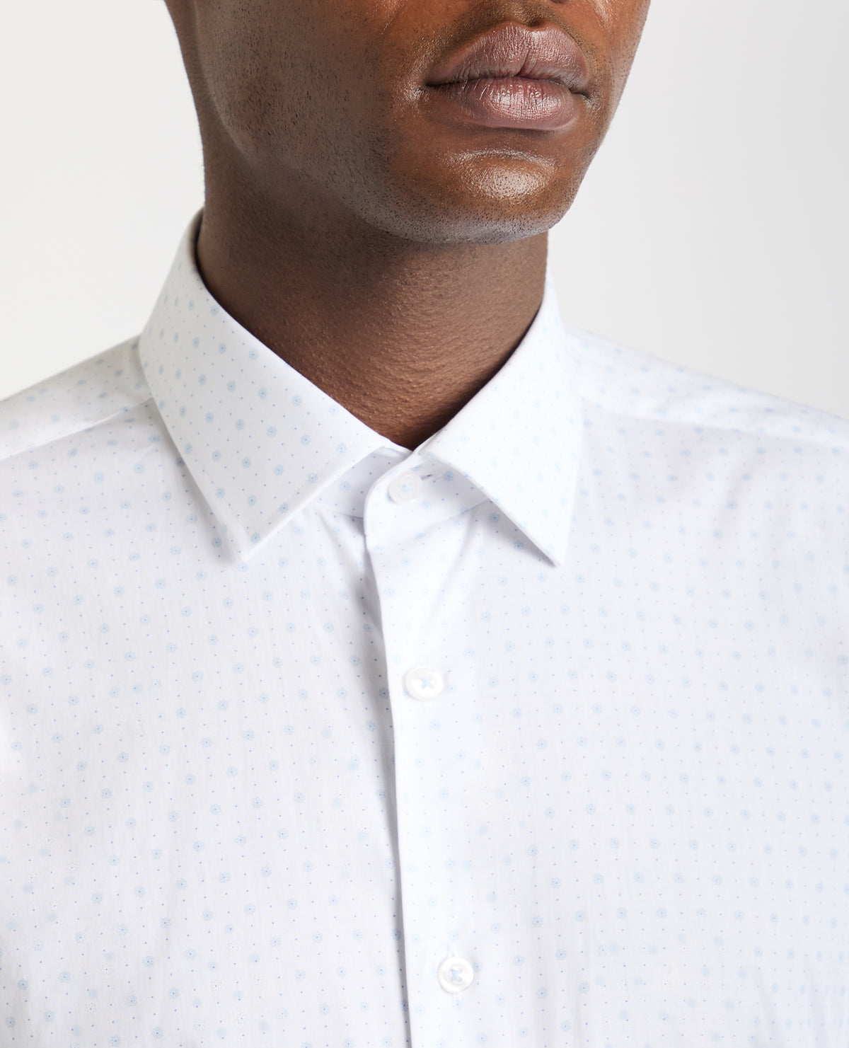 Man wearing a blue Tapered Fit Cotton Stretch Shirt