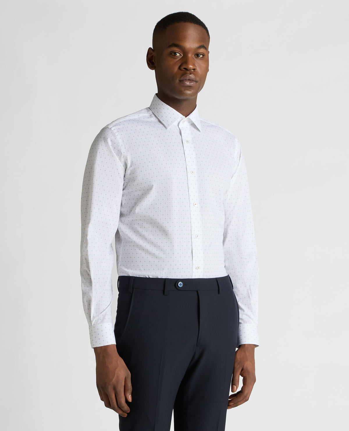 Man wearing a green Tapered Fit Cotton Stretch Shirt