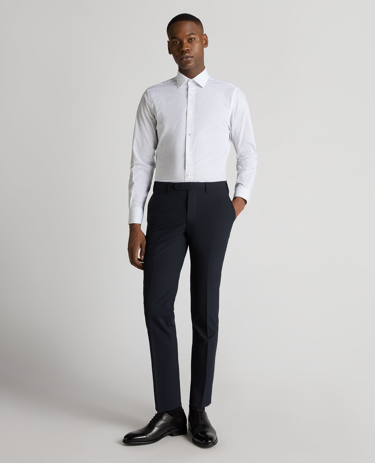 Man wearing a green Tapered Fit Cotton Stretch Shirt