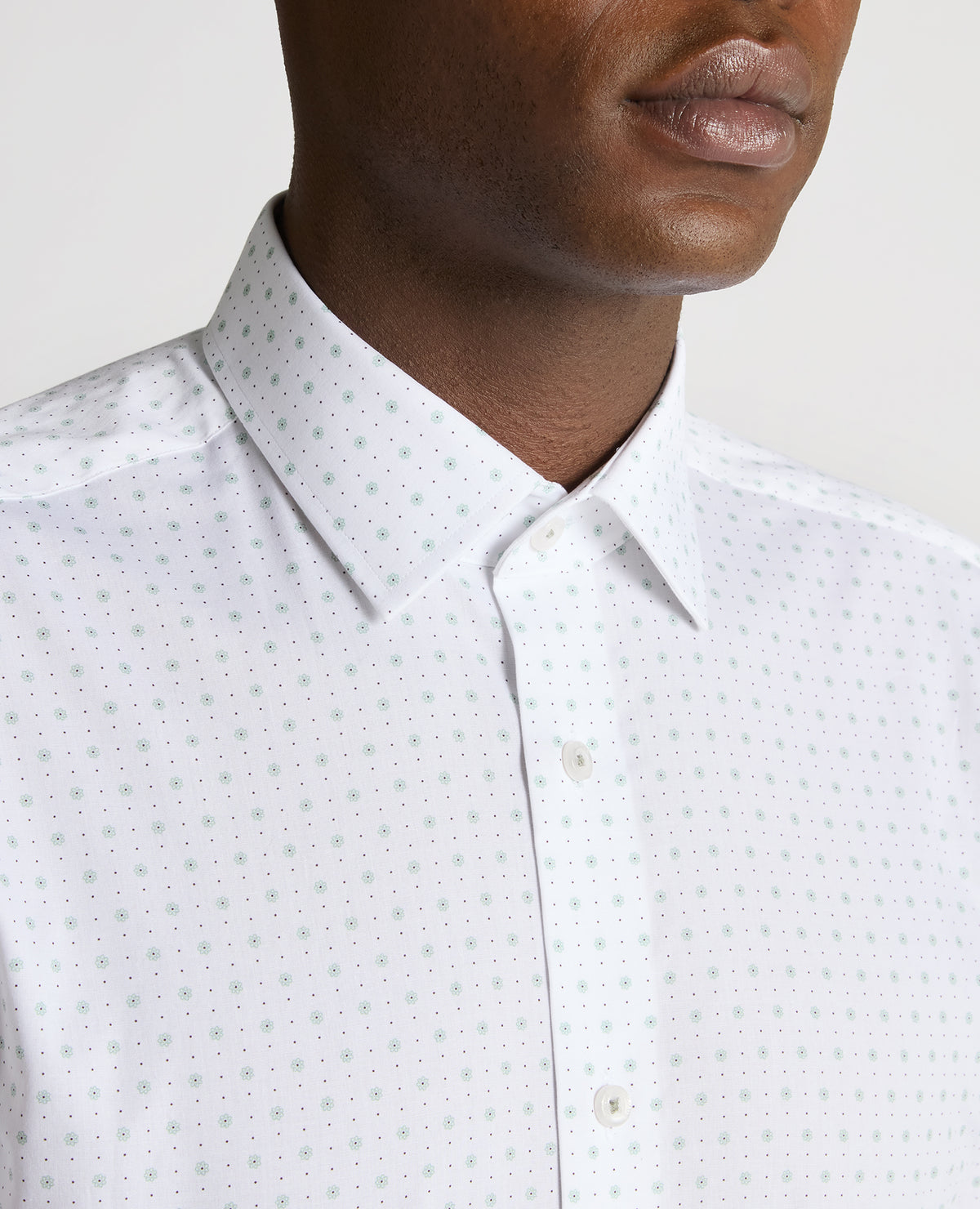 Man wearing a green Tapered Fit Cotton Stretch Shirt