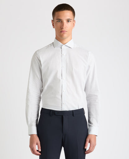 Man wearing a blue Tapered Fit Striped Cotton-Linen Shirt