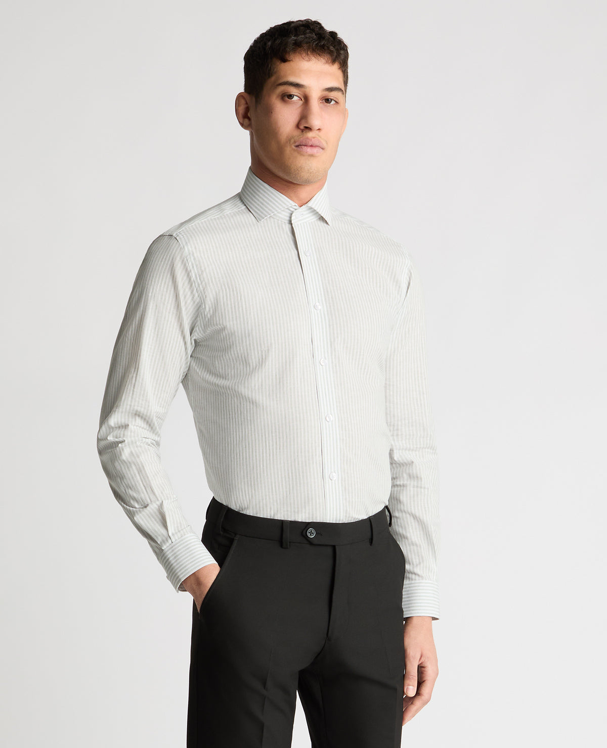 Man wearing a white and green formal shirt