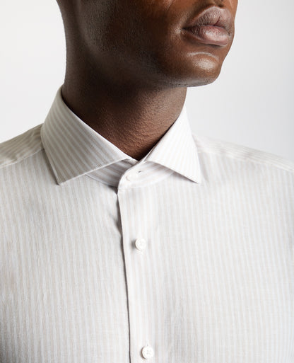Man wearing a brown Tapered Fit Striped Cotton-Linen Shirt