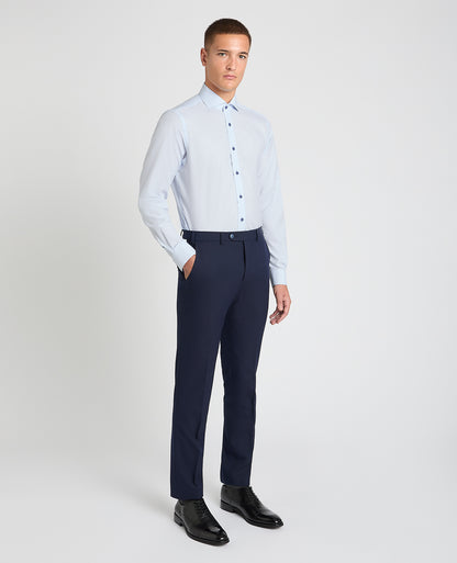 Man wearing a blue formal shirt