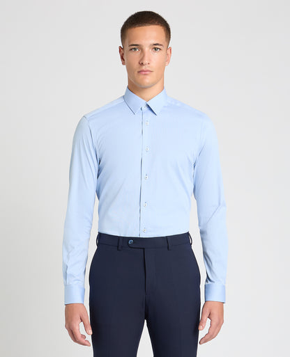 Man wearing a blue formal shirt