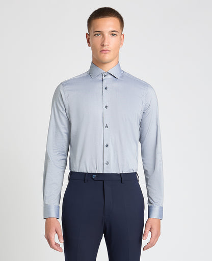 Man wearing a blue formal shirt