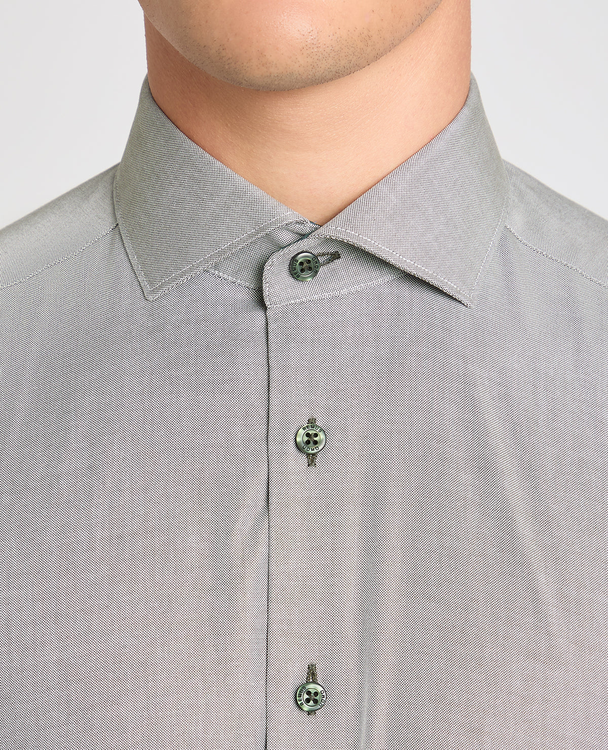 Man wearing a green formal shirt