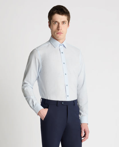 Man wearing a blue formal shirt