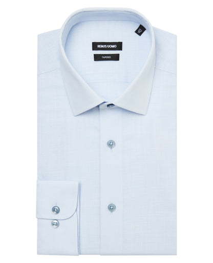 Man wearing a blue formal shirt