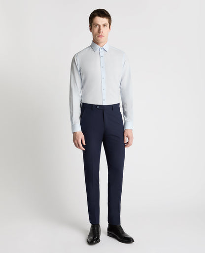 Man wearing a blue formal shirt