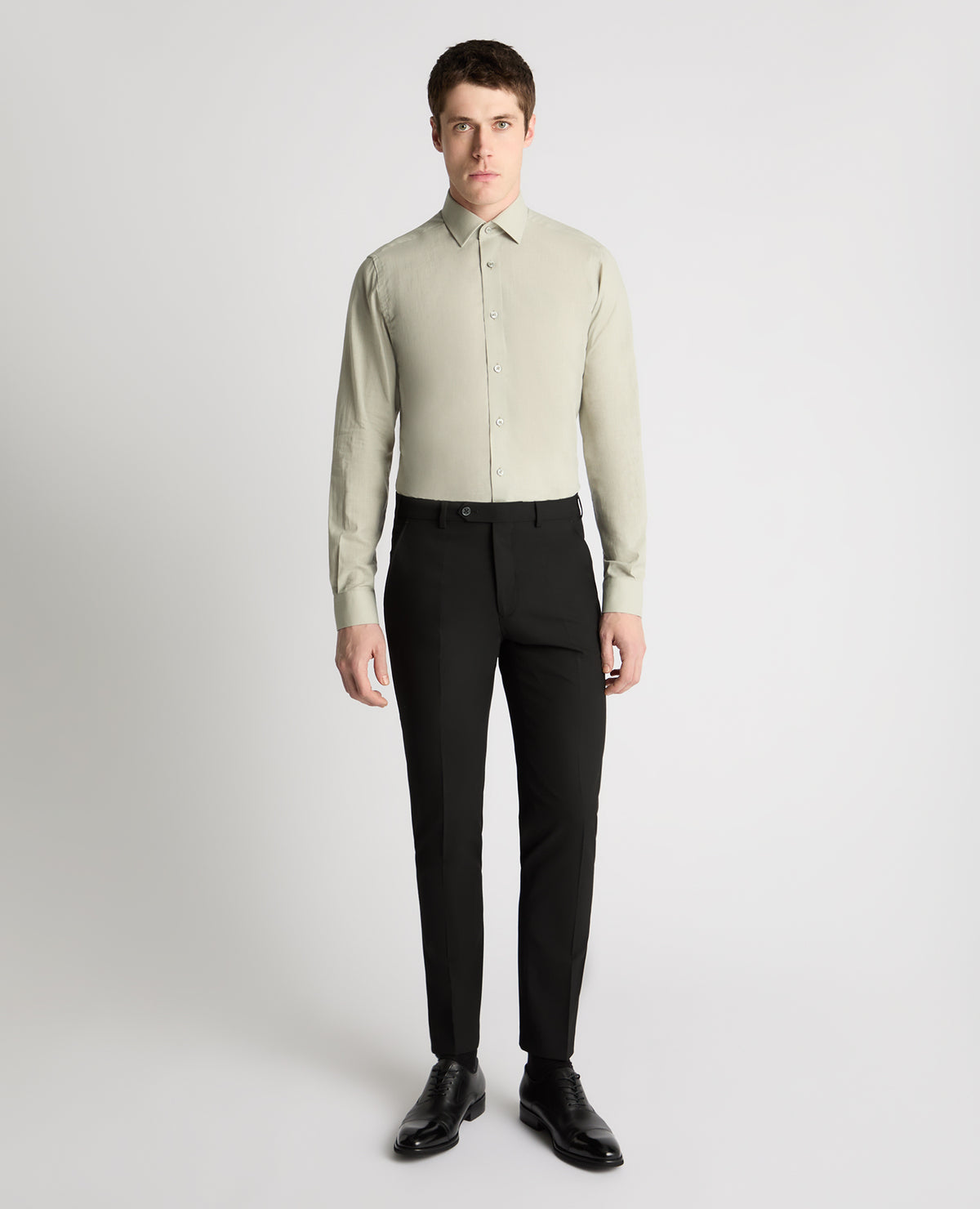 Man wearing a green formal shirt