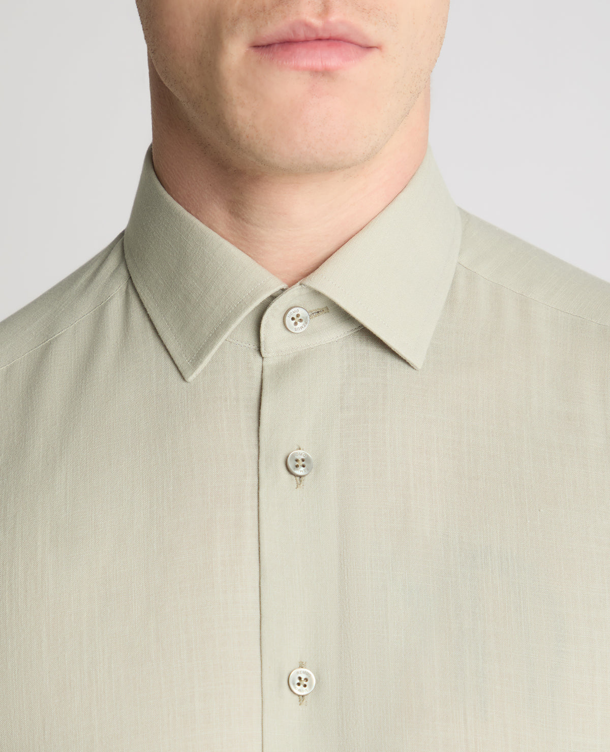 Man wearing a green formal shirt