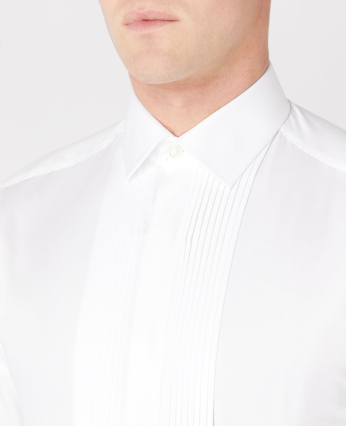 Man wearing a white Tapered Fit Cotton-Blend Shirt