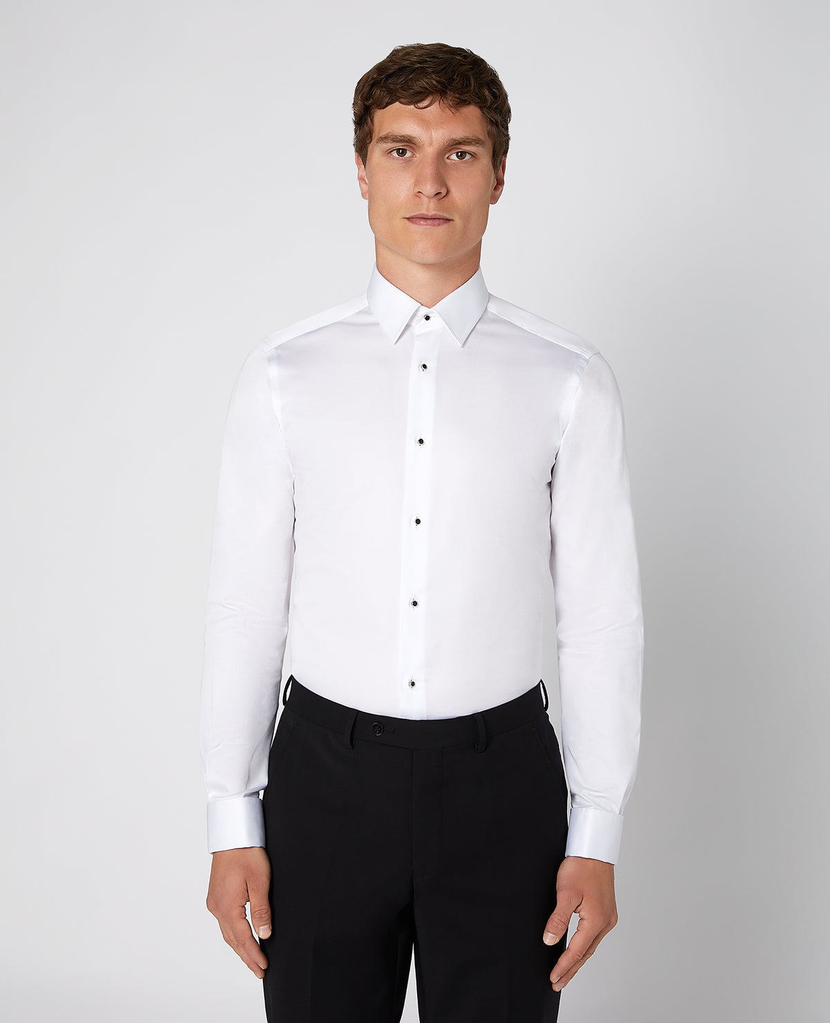Man wearing a white Slim Fit Cotton Evening Shirt