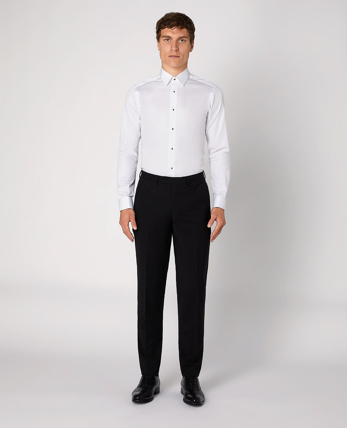 Man wearing a white Slim Fit Cotton Evening Shirt