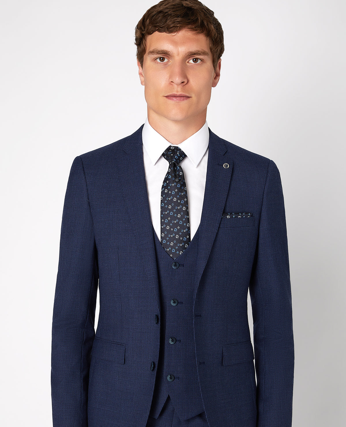 Man wearing a blue Tie