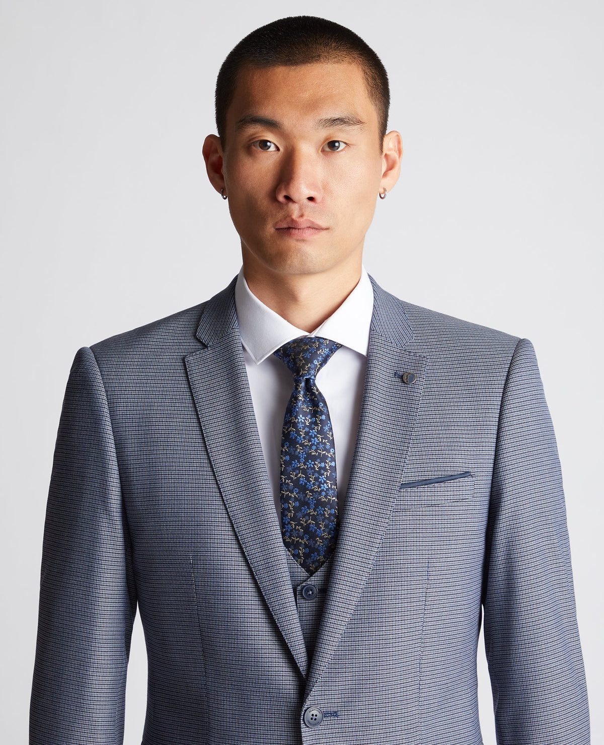 Man wearing a blue Floral Tie