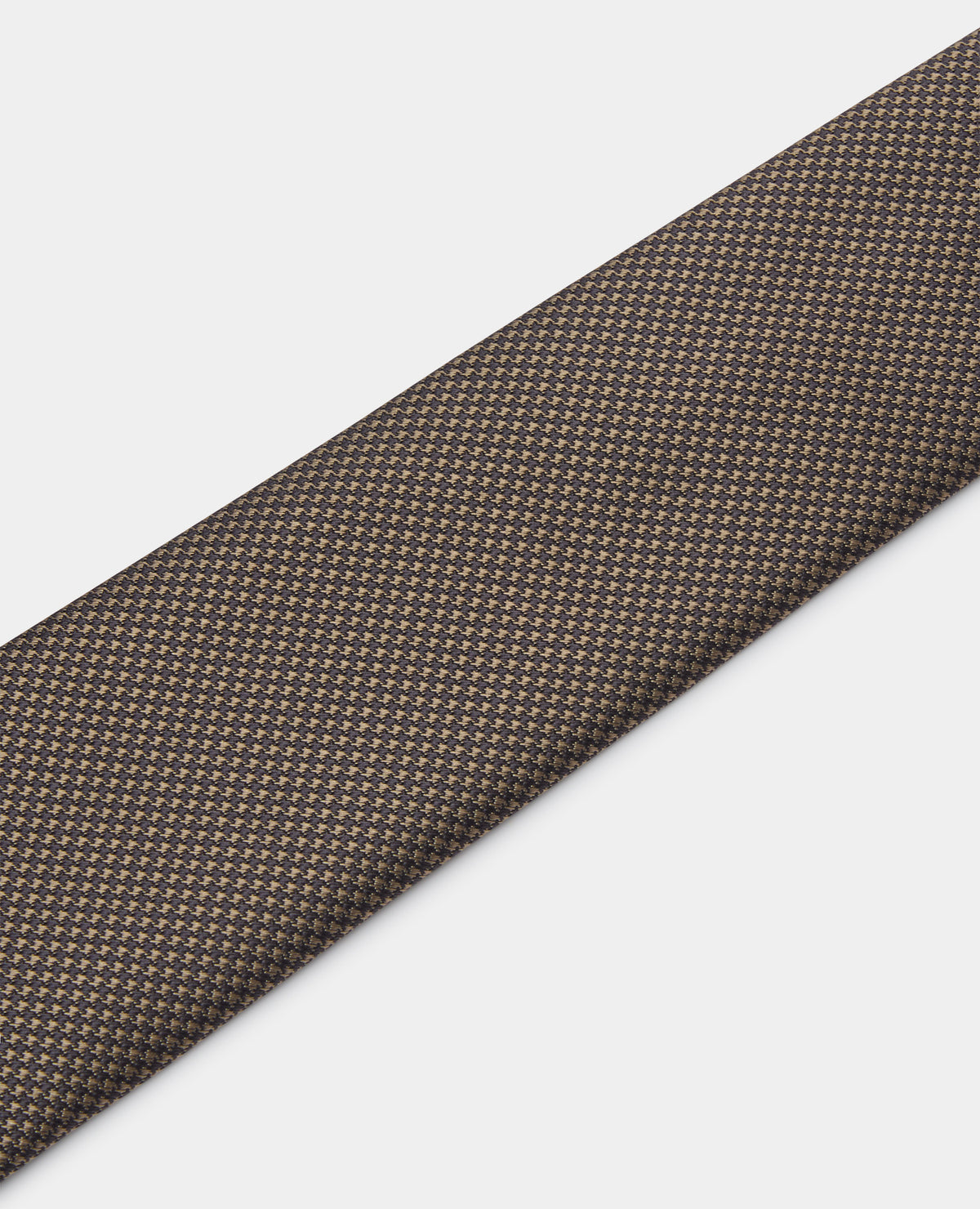 Man wearing a brown Abstract Polka Dot Tie