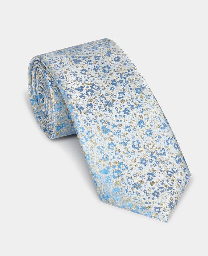 Man wearing a blue Floral Tie