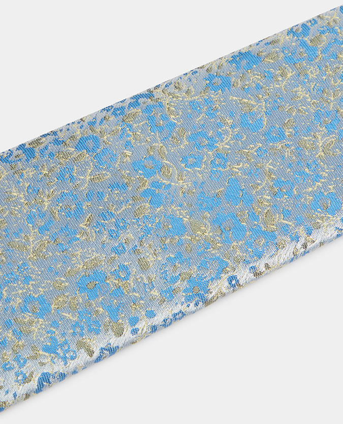 Man wearing a blue Floral Tie