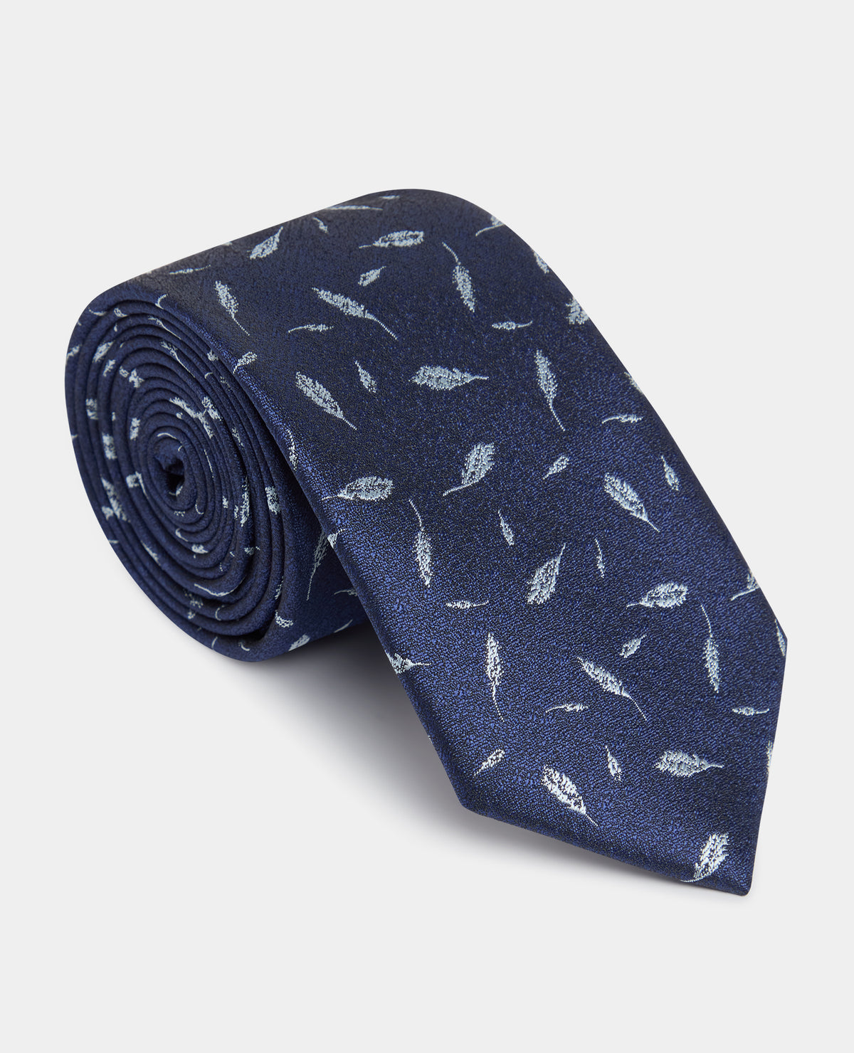 Man wearing a blue Leaf Print Tie