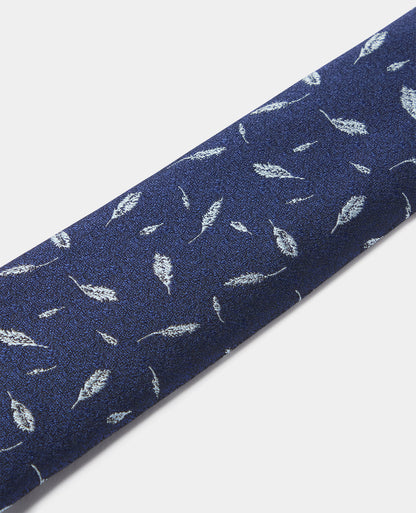 Man wearing a blue Leaf Print Tie
