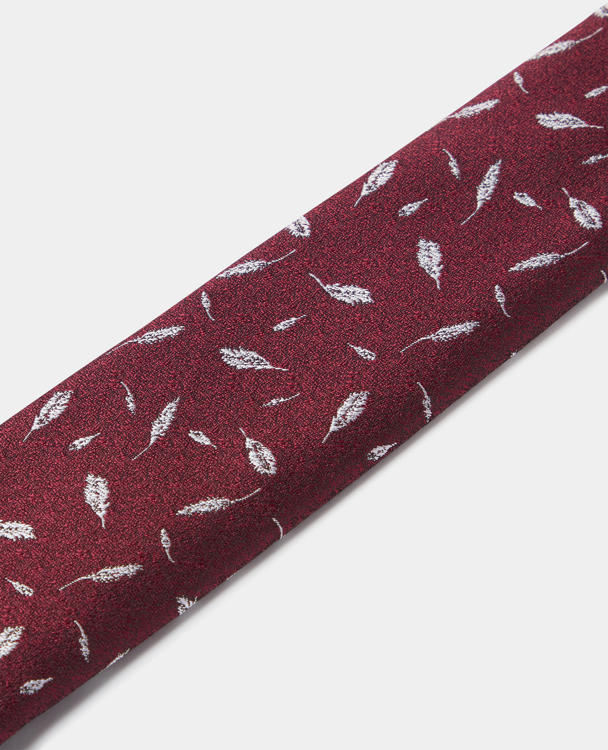 Man wearing a red Leaf Print Tie