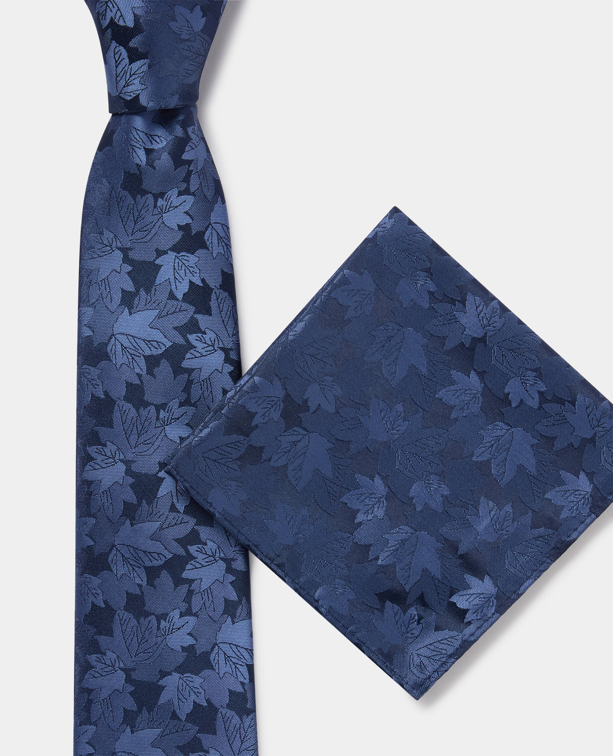 Man wearing a blue Leaf Cluster Print Tie